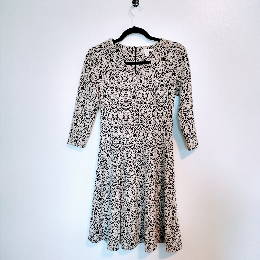Cato lace brocade pattern dress, fit and flare with v neck. 1/2 sleeves size xs.